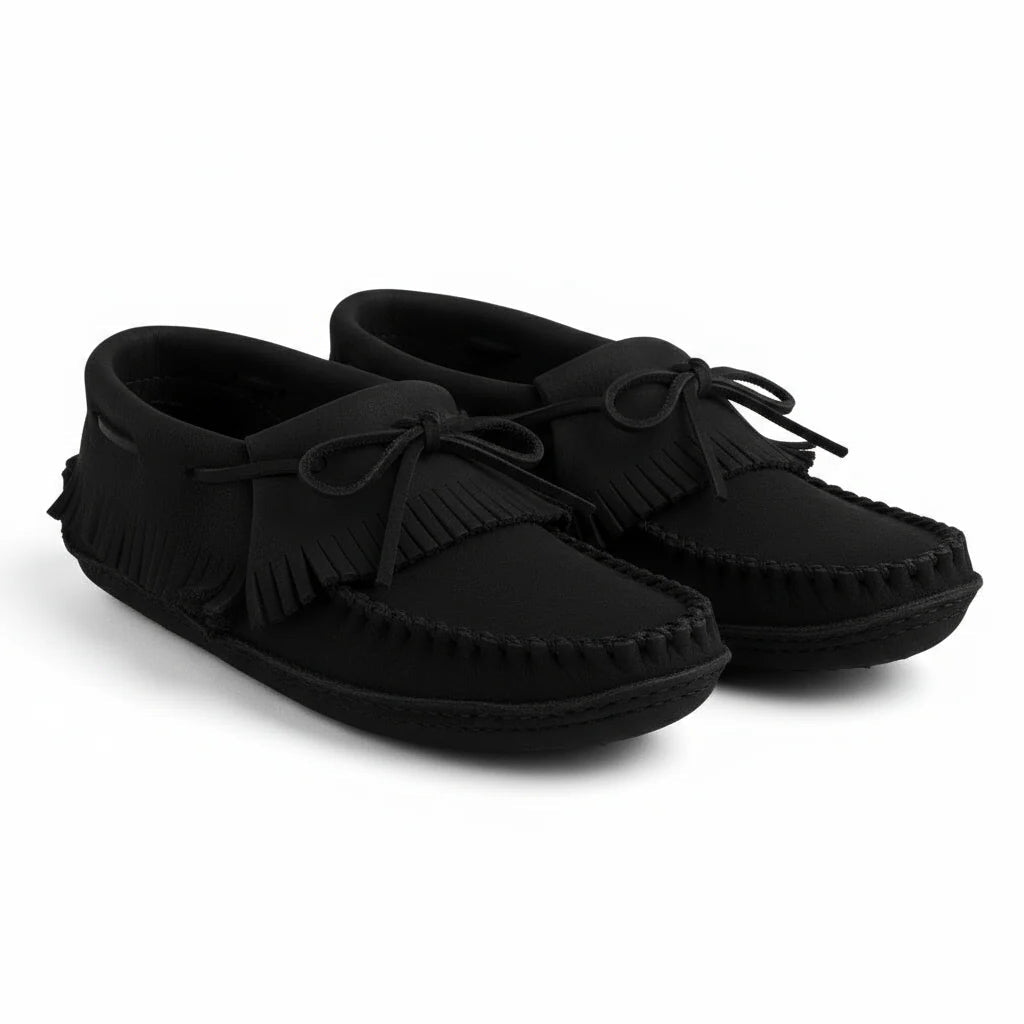 Pair of brown moccasin slippers with fur lining on a white background