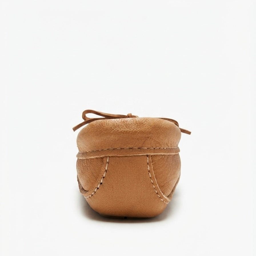 A single tan leather moccasin heel shown from the back on a clean white background.